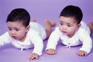 Two Babies (12-18 Months) in a Crawling Position