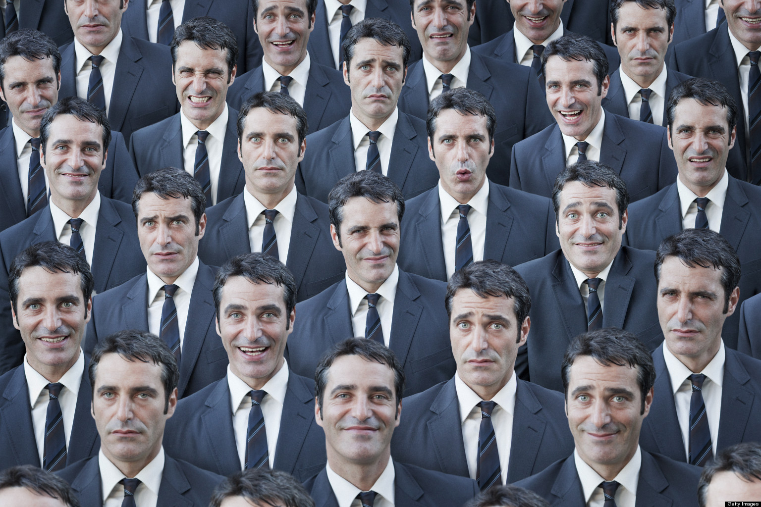 Crowd of businessmen with multiple expressions